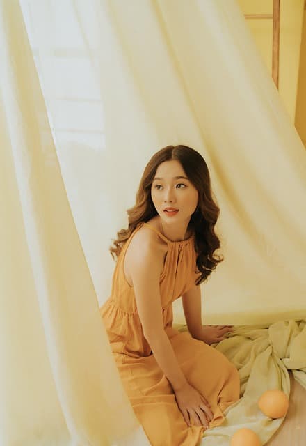 Editorial fashion portrait in soft neutral tones
